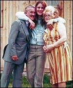 Ozzywithparents.jpg